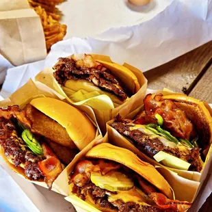 Hellapeño burger: 2 patties, pepperjack cheese, grilled onions, pork bacon, jalapeños, onion rings, smack sauce, mikes hot honey