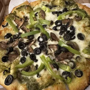 Pizza with extra cheese, mushrooms, olives and bell pepper....Delicious!