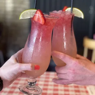 Doggy Punch indoggo Strawberry Gin,  redbull edition watermelon, over crushed iced &amp; garnished with a strawberry &amp; lime slice.