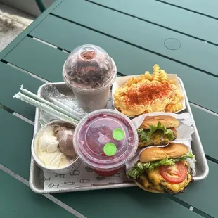 Custard, pride shake, spicy cheese fries, and shack burgers