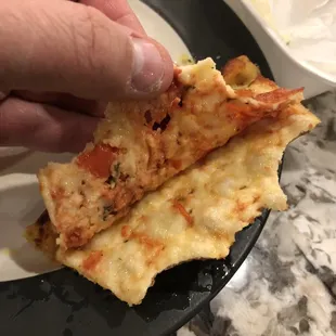 I know I'm old fashioned but I expect my pizza to have something between the cheese and the crust.
