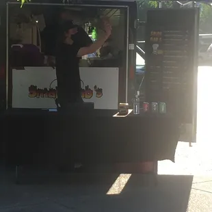  man standing in front of a food truck