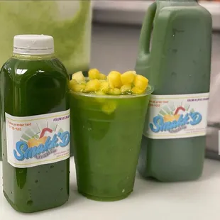 a green smoothie and a green juice