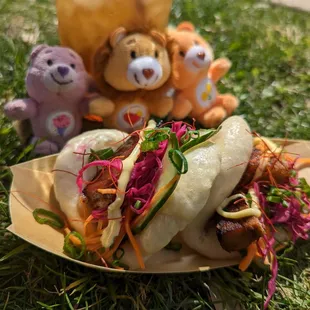 a teddy bear and a plate of food