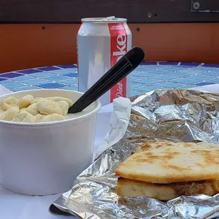 Cup of chicken velvet with crackers, half Dirty Swede panini