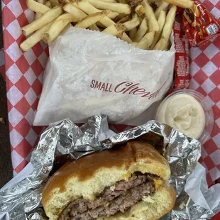 Signature Double Cheeseburger w/ fries and the Garlic Aioli sauce. Hit the spot!