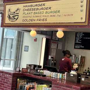 a sign for hamburgers and burgers