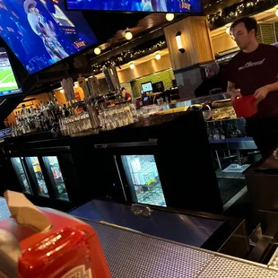  a bartender at a bar