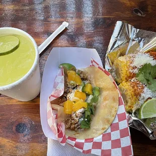 Margarita, chicken mango taco, and elote.