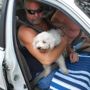 Jon and his wife Teri, volunters with Small Paws, taking our friend to a new, safe life