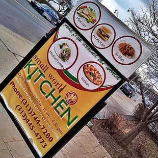 a sign on a sidewalk