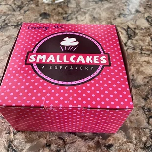a pink box with polka dots