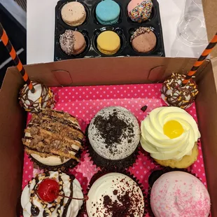 a dozen cupcakes in a box