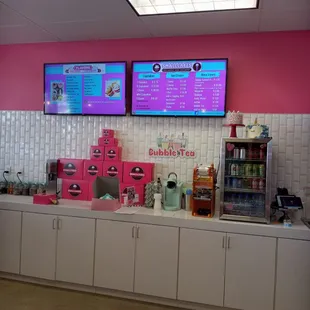 a pink and white kitchen