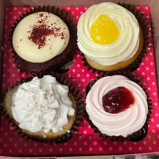 (Top Left) Red Velvet Cupcake (Top Right) Lemon Drop Cupcake (Bottom Left) Wedding Cake Cupcake (Bottom Right) Strawberry Cupcake