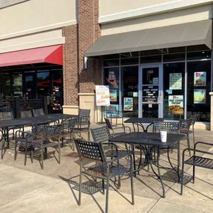 tables and chairs outside a restaurant