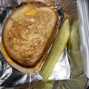 Grilled cheese and pickle spear