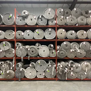 stacks of rolls of carpet