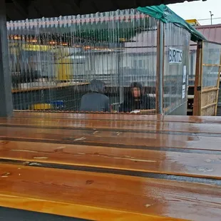 The view from one of the two stand-up dining tables outside the main covered area