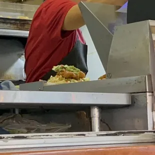 that piece of fried fish in the "the baja one" burrito looks scrumptious