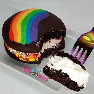 PRIDE Whoopie Pie:
Traditional Chocolate Whoopie Pie w/Vanilla Pie. 

LGBTQIA PRIDE Colors hand piped w/vanilla bean batter then baked in.