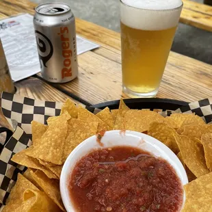 a plate of chips and a beer