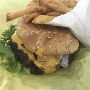 Double Smash burger with lettuce pickles red onion and tomatoes. Combo comes with fries and a drink for $16.