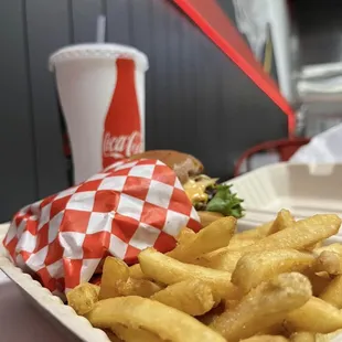 a tray of fries and a drink