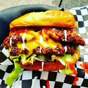 Dirty Deluxe- Double French Onion smash patties,  American cheese,  pickles, Lettuce and Burger Sauce.