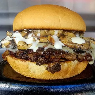 $7 Mushroom Smash. French Onion Infused Smash Patty,  Swiss cheese, sauteed mushrooms and garlic Aioli.