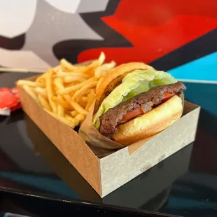 Single with lettuce, tomato, grilled onions, and fries well done! Broke da mouth!