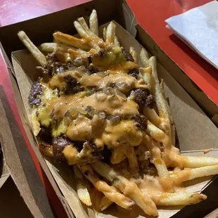 a box of cheese fries