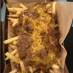 Chili cheese fries with grilled onions