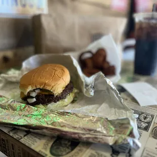 Single burger. House sauce (do you like pepper? ), lettuce, tomato, pickle, onion. 10/2024
