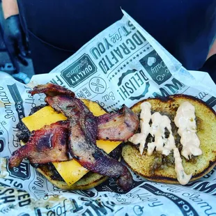 Our smash burger with applewood bacon