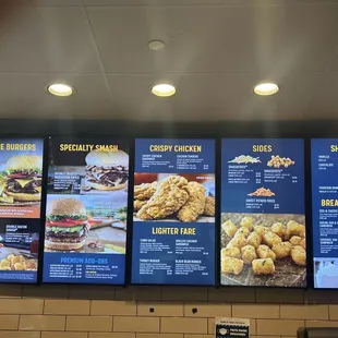 menus on the wall of a fast food restaurant