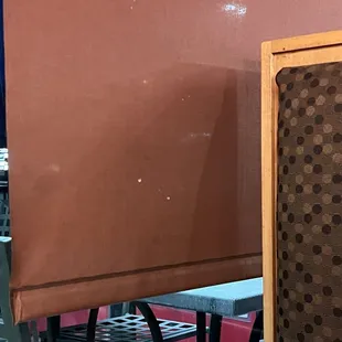 Food splashed on window shade.