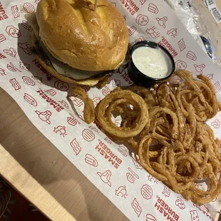 a sandwich and onion rings