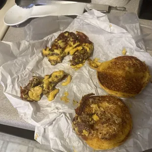 This is the lack of anything I paid for. The dark stuff is just the cheese that was cooked on the grill. There is no bacon.