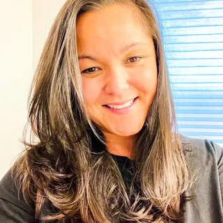Tasha C.
