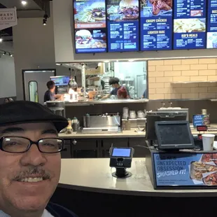 Smashburger staff preparing my order.