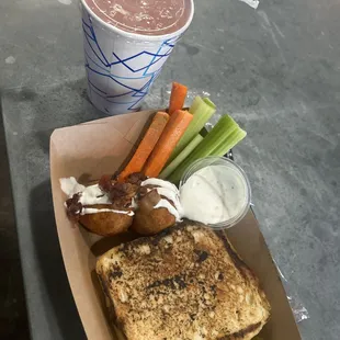 This is what you get for $15? A burger, celery, carrots, two of their famous potato balls, and a hand made 12 oz drink.