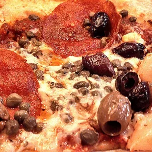 Quatro Fromaggi with capers, olives, pepperoni and roasted garlic - my fav