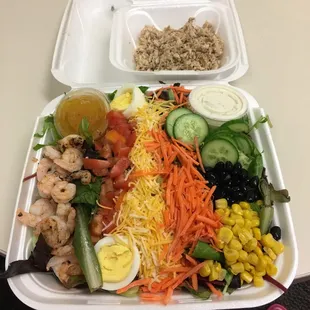 Chicken and shrimp salad. The chicken was too hot to place on the salad right then. Wonderful group of people great personalities