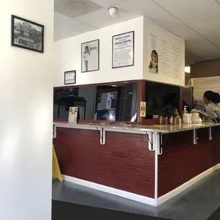 the counter area of a coffee shop