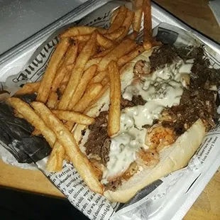 Philly Cheesesteak with Shrimp and side of fries. $15 approx. Worth every penny.