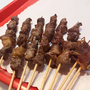 Chinese BBQ Lamb, Chicken Gizzard, and Bacon Wrapped Mushrooms
