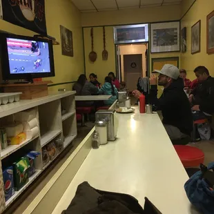 a group of people sitting at a table