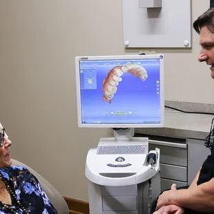 Dr. Volker listening to a patient&apos;s concerns