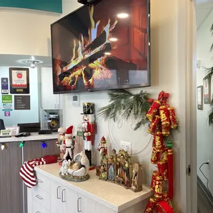 Their waiting area has a fireplace!